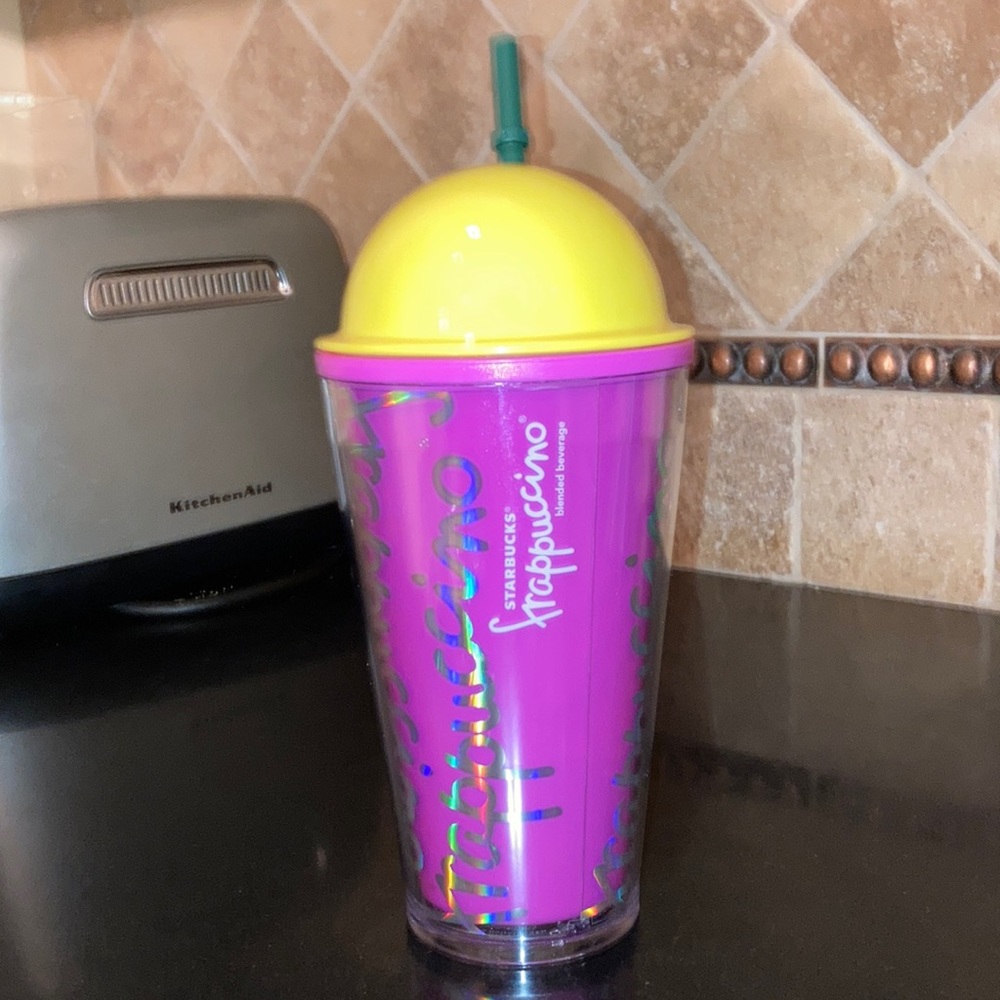 Bright pink and yellow Starbucks Frappuccino cup